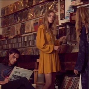 Yellow free people long sleeve wrap around mini dress size xs